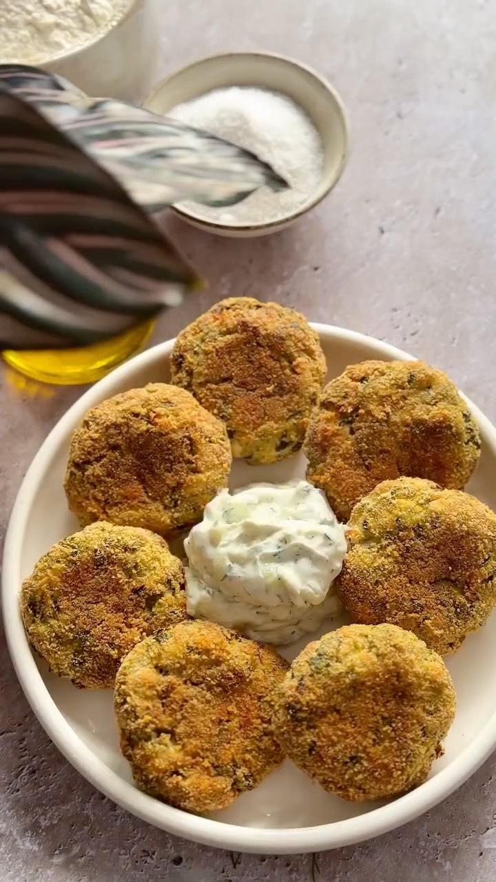Baked Kolokythokeftedes with Feta and Tzatziki