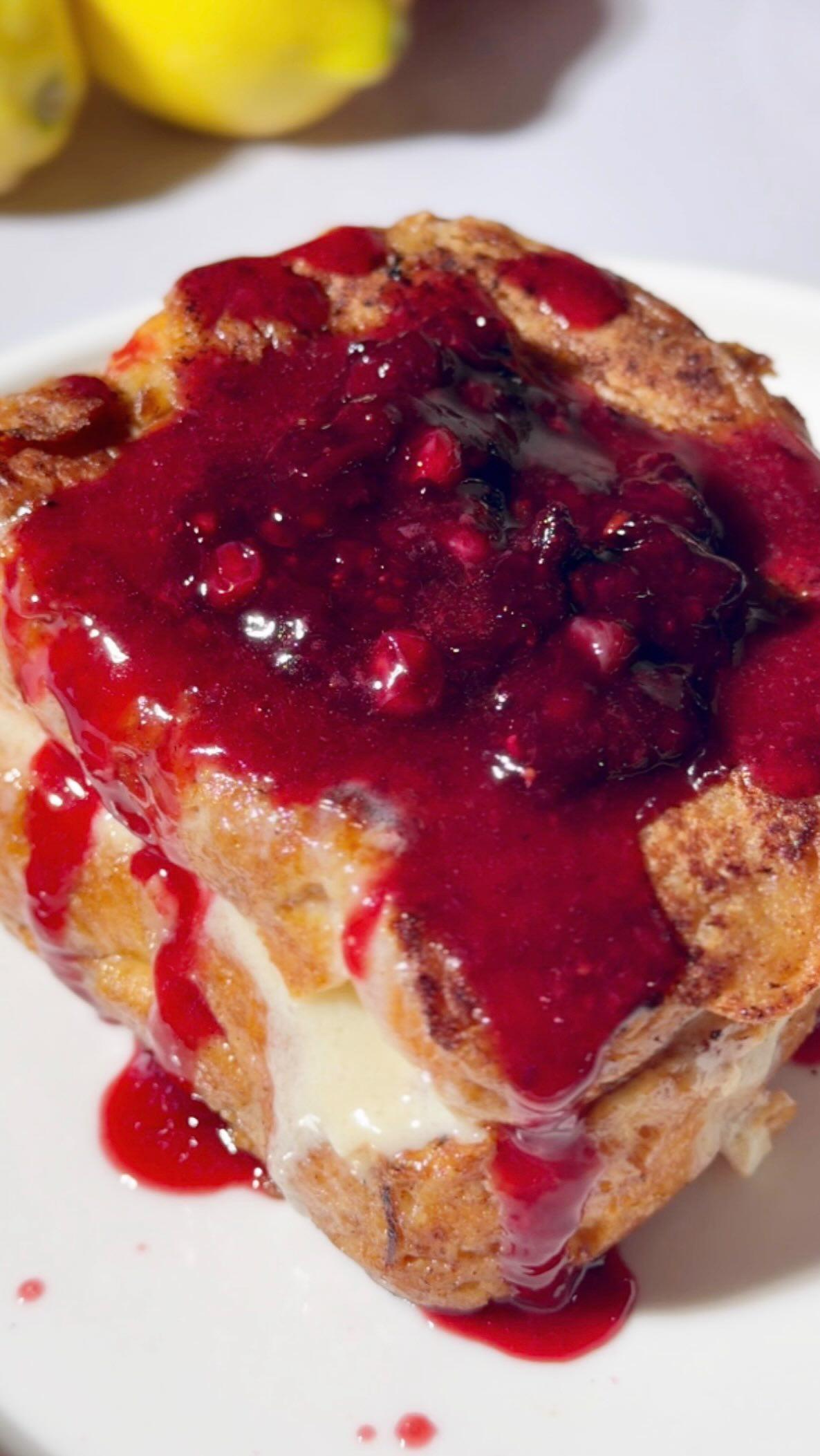 Stuffed brioche French toast with mascarpone & berry drizzle